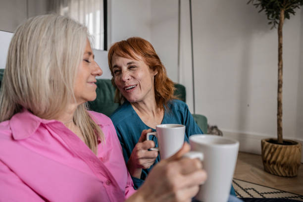 istock Friends Enjoying Coffee and Conversation 2067981116