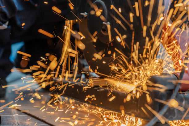 istock Worker uses a steel cutting (circular saw) industry machine to cut steel. 2068013650