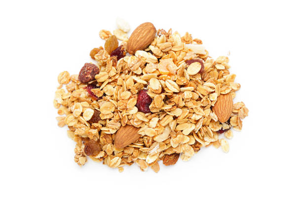 istock Tasty granola isolated on white background 2068098047