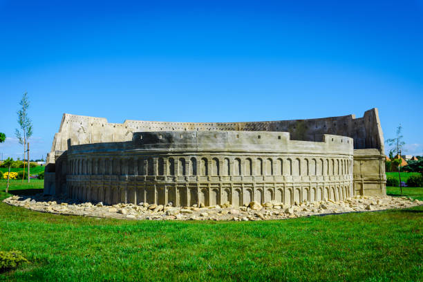 Miniature small Colosseum at summer sunny park.