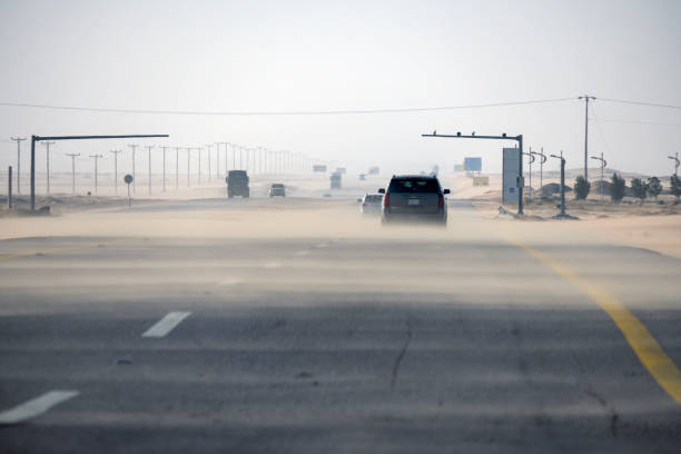 Riyadh, Saudi Arabia - March 01, 2024: Drive in sand Storm in desert road Saudi Arabia