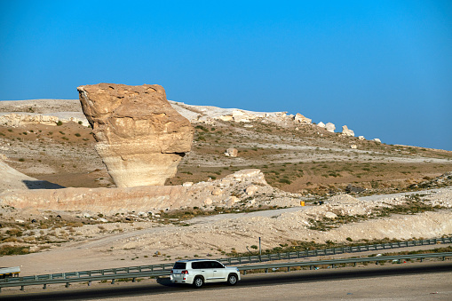 Riyadh, Saudi Arabia - March 01, 2024: Road trough the desert Riyadh-Mecca highway in Saudi Arabia