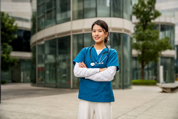 istock Portrait of a young, happy and helping nursing worker 2068154886