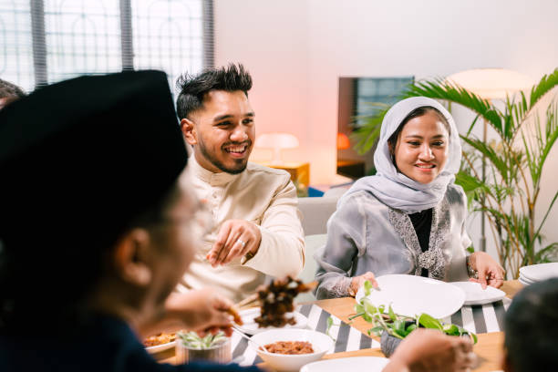istock Friends Celebrating Raya Eid al-Fitr with Traditional Foods 2068163349