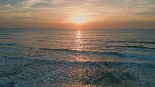istock Aerial majestic bright sunrise illuminating endless ocean. Beautiful sunlight 2068176085
