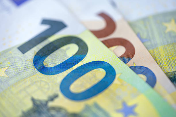 Background of one hundred and two hundred euro bills