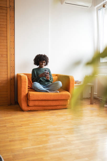 istock Woman texting her friend 2068195641