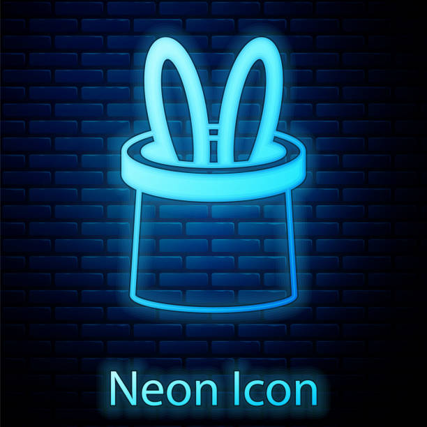 glowing neon magician hat and rabbit ears icon isolated on brick wall background. magic trick. mystery entertainment concept. vector - magic magic trick magician magic wand stock-grafiken, -clipart, -cartoons und -symbole