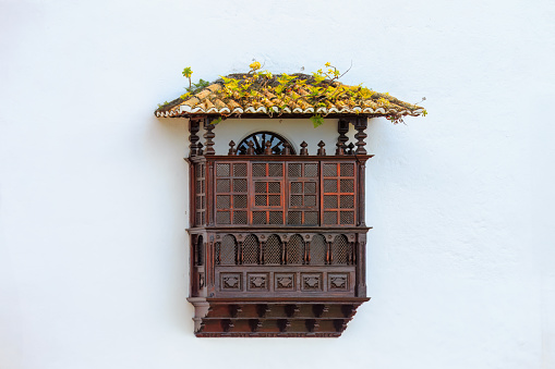 Traditional canarian architecture -wooden balcony in Icod de Vines, Tenerife island, Spain