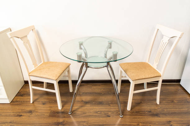 istock A table and two chairs are set up in a room 2068312402