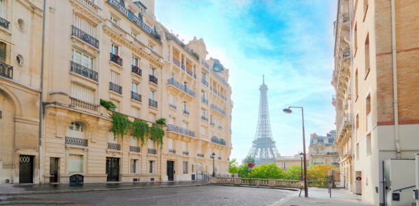 istock eiffel tour and Paris street 2068417513