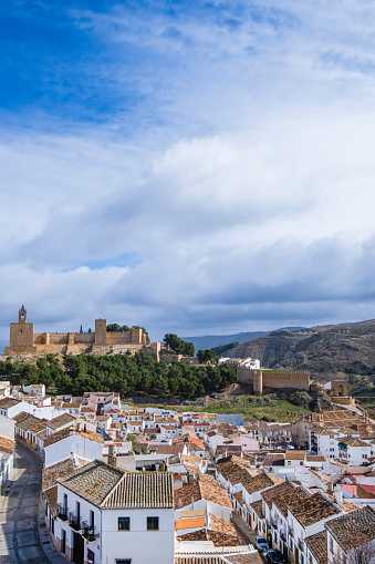 Panoramic view on the historic district of Antequera, where on the hill stands out the Alcazaba, a Moorish fortress erected over Roman ruins in the 14th century