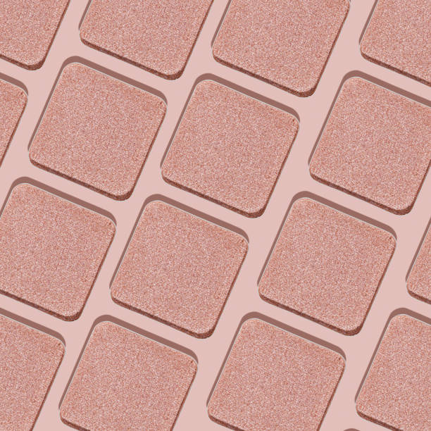 istock Minimal pattern eye shadow glitter pink swatches with shadow, monochrome photo as background, refill compact eyeshadow, shiny colored powder fo makeup, square shape metal pack, cosmetic texture 2068459214