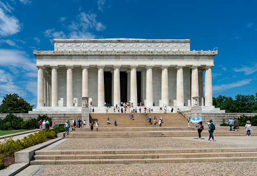 People at the Lincoln Memorial in Washington DC on a beautiful summer day.