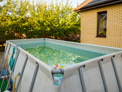 Bulk frame pool in the courtyard of the house.