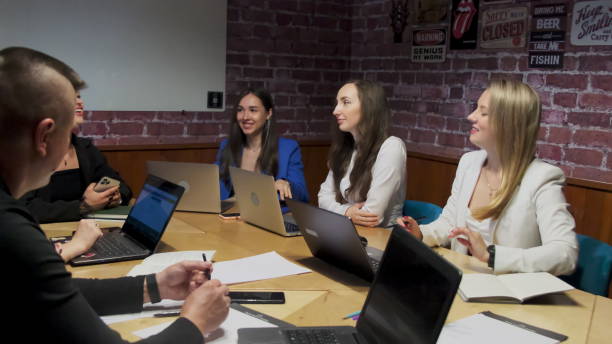 istock Busy colleagues in formal clothes discuss new project 2068555224