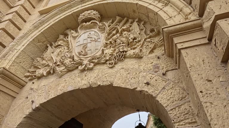 Passing Through The Main Gate Of Mdina (Vilhena Gate) In Malta