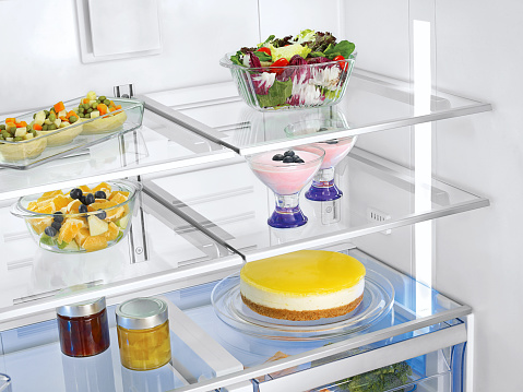 Detail from a modern fridge full of fresh food