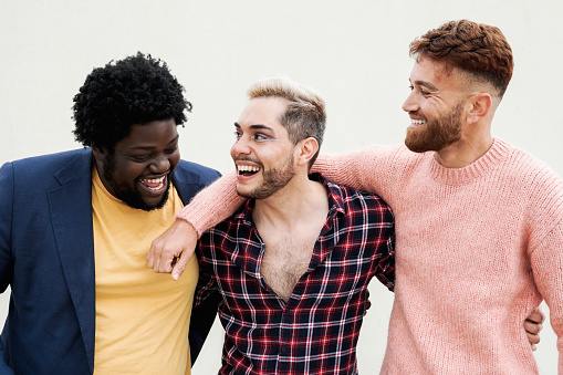 Diverse trendy group of friends having fun together. LGBTQ community and equality concept