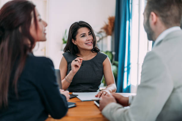 istock Group of business persons talking in the office. 2068587528