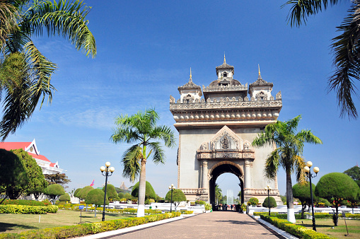 Vientiane, Laos:  Patuxai (literally Victory Gate or Gate of Triumph) - Patuxai was built in the 1960s as a “Monument to the Heroes of the Royal Army”, celebrating Laos' independence from France (1949). It was popularly known simply as Anousavali (monument) or in French as the 'Monument Aux Morts'. In 1995, on the 20th anniversary of the seizure of power by the communists of Pathet Lao, the triumphal arch was given the new dedication to “The Heroes of August 23, 1975” (Day of the Communist seizure of power in Vientiane).