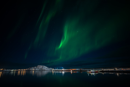 Northern light or Aurora borealis viewed from Reine village in Lofoten island, Norway,