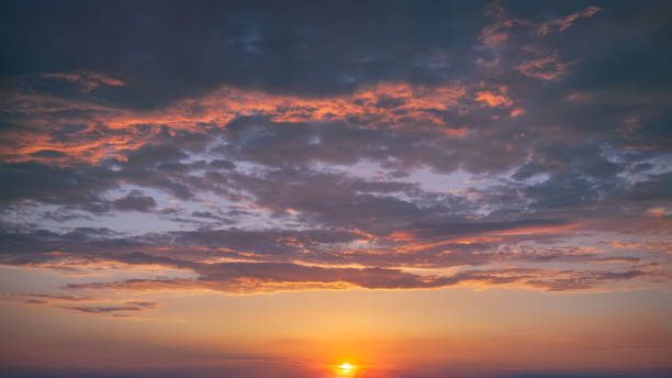 istock Colorful vibrant sky with clouds at beautiful sunset as natural background 2068735655