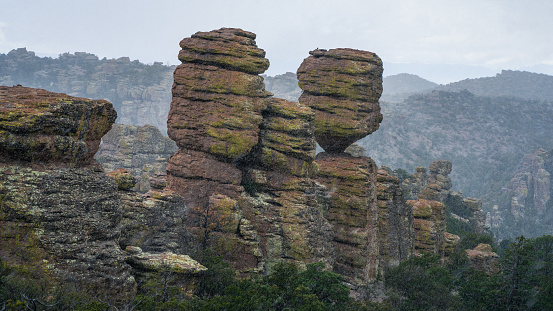 Rock hoodoos of in Chiricahua National Monument during winter storm in Coronado National Forest