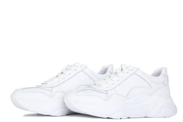 istock Pair of white shoes isolated on white background 2068785595