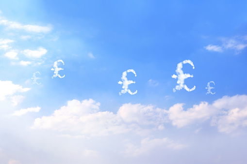 Money making. Great Britain pound sterling sign in the clouds. Cloud shaped as GBP currency symbol. British pound symbol made of cloud. Business, development and prosperity concept