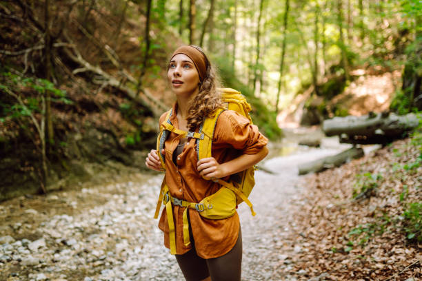 istock Young woman exploring mountain plains. 2068821657