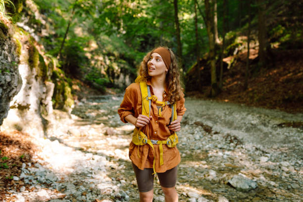 istock Young woman exploring mountain plains. 2068822186