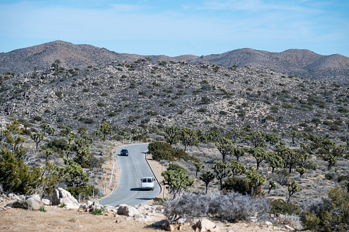 Road and vehicles in a desert landscape, Joshua National Park