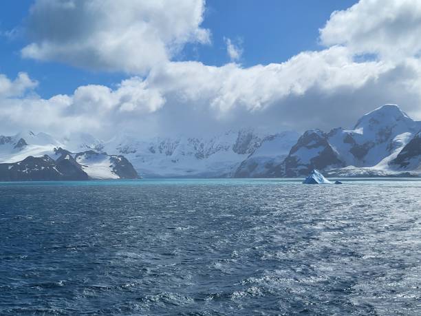 istock Blue and grey Antarctica landscape with mountains and icebergs 2068926460
