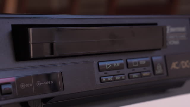 Stopping and Ejecting VHS Video Cassette Tape From Vintage 1980's Player, Close Up