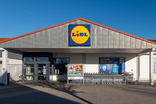Freystadt, Germany - January 28, 2024: Store of the Lidl supermarket chain in the german town Freystadt, Bavaria. Sunny winter day with blue sky. Lidl has its headquarter in Neckarsulm, Germany with over 10000 stores in Europe..
