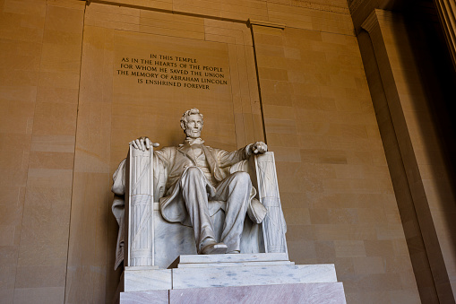 Tourism and historical attractions at Lincoln Memorial. Lincoln statue in Washington, D.C. Low angle view.