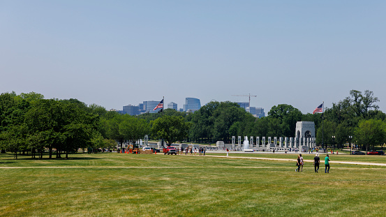 Urban skyline stretching along the National Mall with the World War II Memorial on a clear day in Washington, D.C.