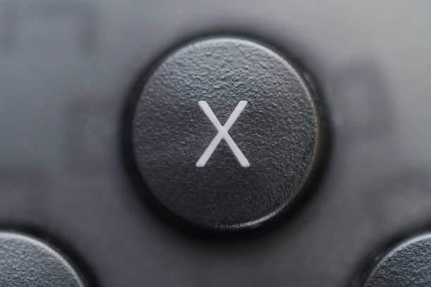 Closeup macro of x button of a gaming controller