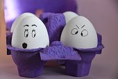 Photo of eggs in a purple carton
