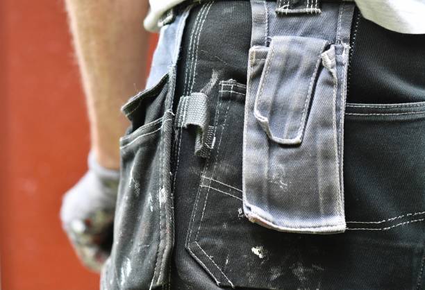 istock Closeup of the working pants of painter or worker 2069040540