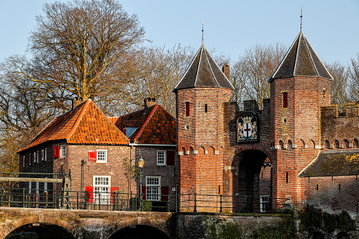 Amersfoort, The Netherlands, March 8th, 2024; Historic Land- and watergate the Koppelpoort in Amersfoort at winter season.