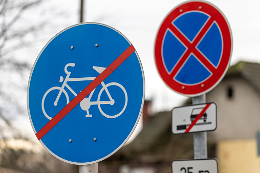 End of bicycle lane and no stopping traffic signs