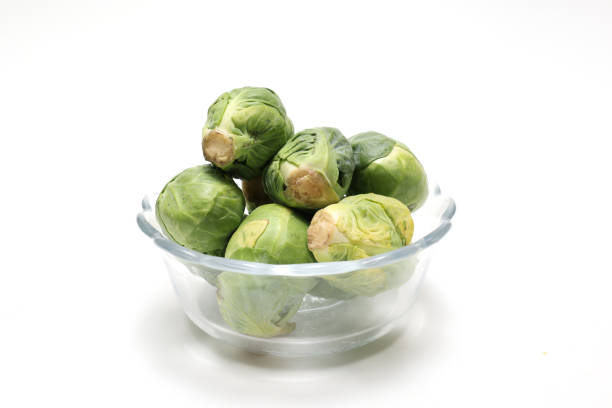 Lush Brussels sprouts with bright green leaves create a delightful display, perfect for a nutritious dinner option.