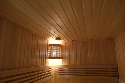 wooden shade on a lamp in a Finnish sauna