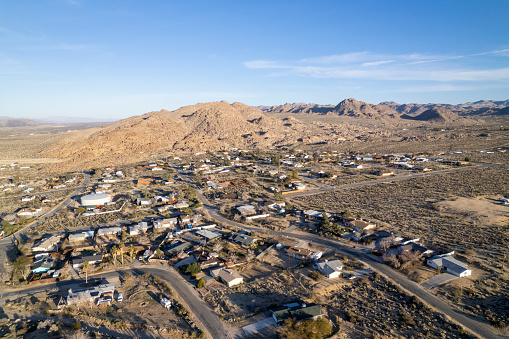Aerial view of Joshua Tree town in the desert in morning light