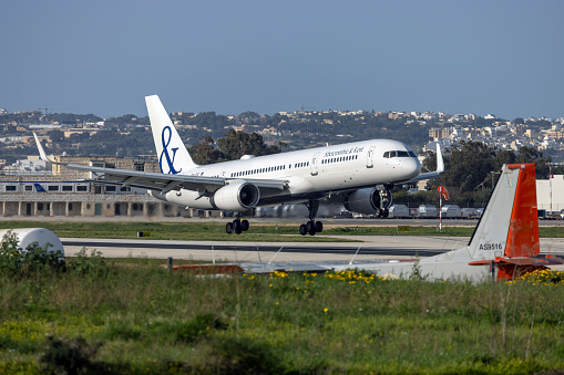 Luqa, Malta - March 8, 2024: Abercrombie and Kent (Icelandair) Boeing 757-23N (REG: TF-FIC) landing runway 13 after a 6 hour flight from Nairobi.