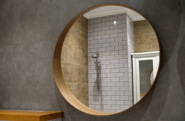 istock round mirror on the bathroom wall 2069141230