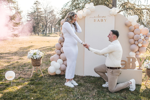 She said yes! The young man proposed to his girlfriend during the baby gender reveal