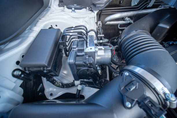 istock View of the car anti-lock braking system ABS from the side. ABS additional safety feature prevent wheels locking at heavy braking, preventing vehicle skidding or hydroplaning. Service in garage. 2069172530